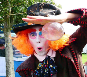 MAD HATTER THEMED JUGGLER HIRE -UK JUGGLER PERFORMERS TO HIRE